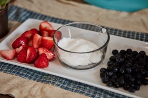 Sugar free coconut whipped cream with berries